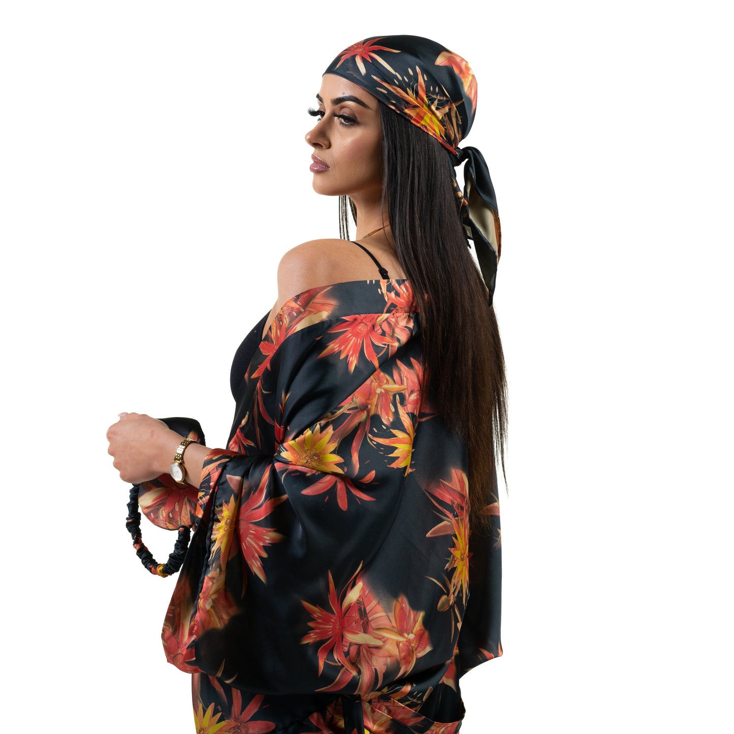 Natalie Anderson Black Satin sunburst kimono with orange and yellow flowers - close up matching eye mask and hair scarf